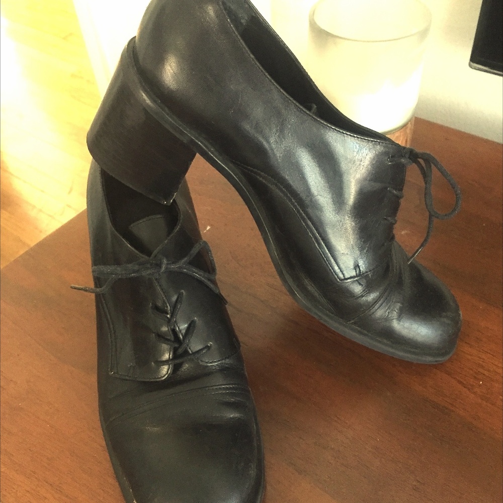 Black leather Apostrophe heeled brogues